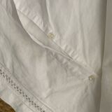 White cotton pillowcase with embroidery and monogram from the 1960s.