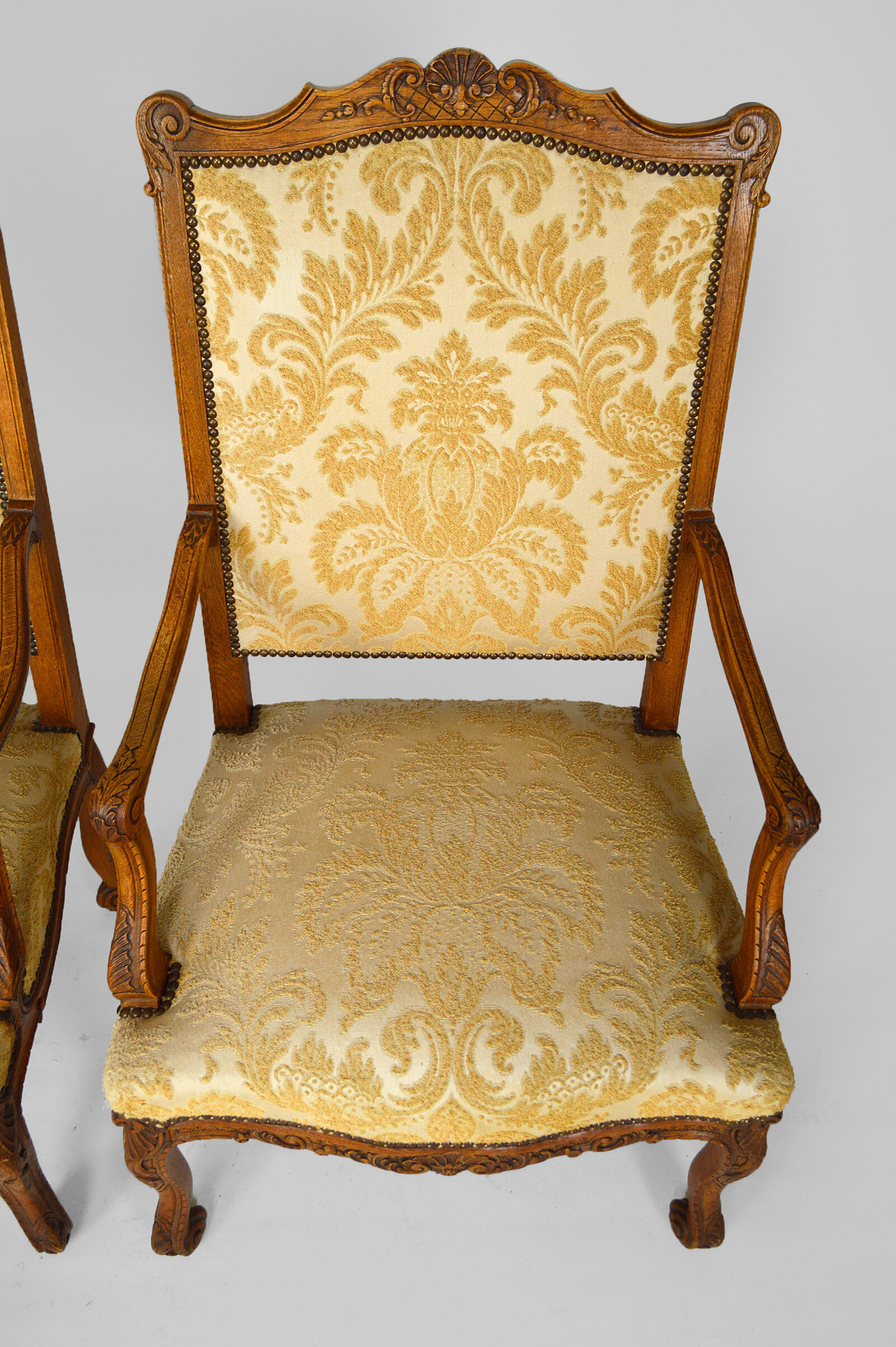 Set of 2 armchairs in carved oak, Louis XV style