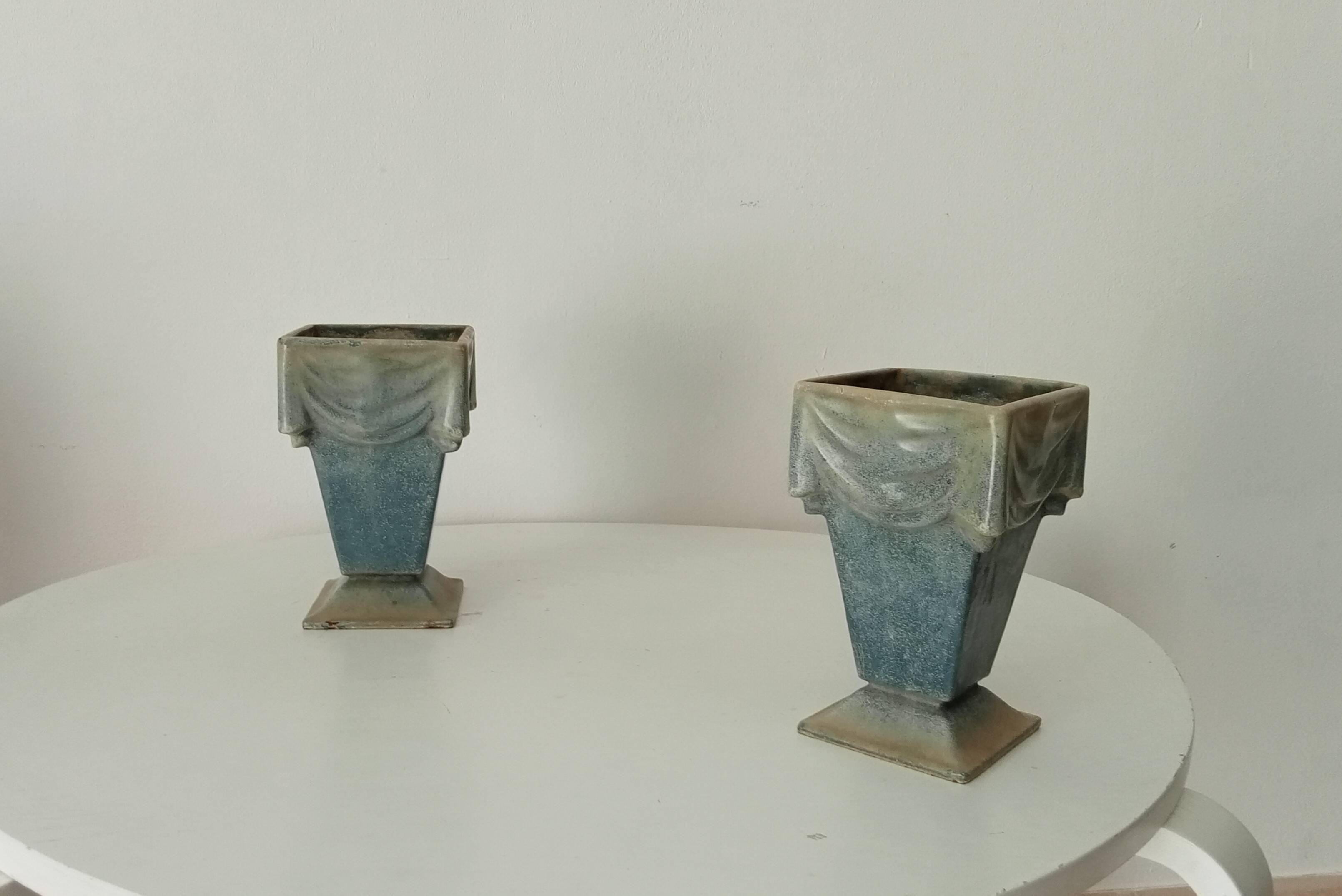 Pair of old art deco vases in enameled cast iron