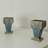 Pair of old art deco vases in enameled cast iron