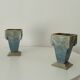 Pair of old art deco vases in enameled cast iron