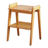 Bedside or side table with compass legs.