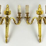Paire d'Appliques Murales - 2 Lumières - Style Louis XVI - Bronze Doré