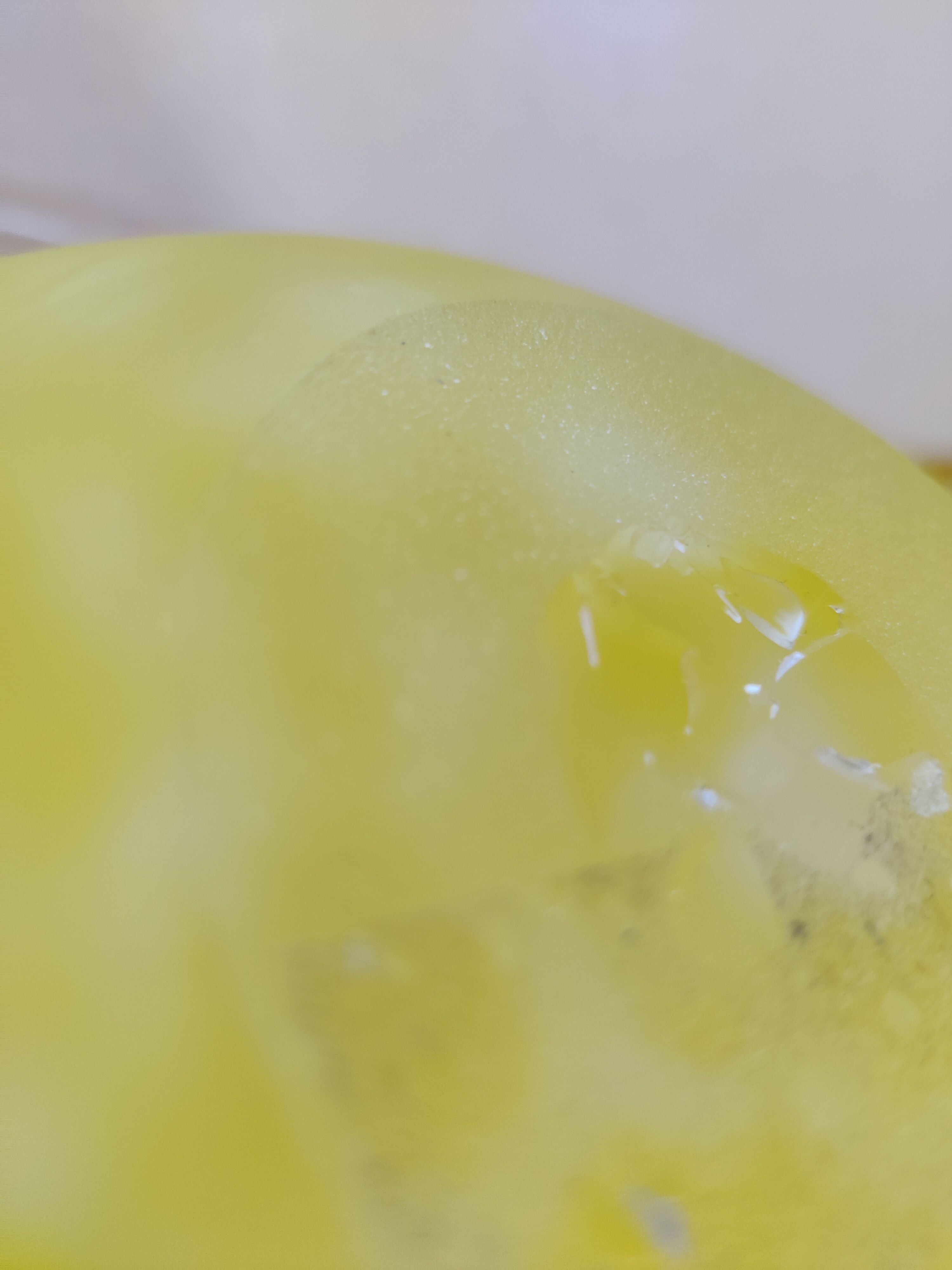 Yellow speckled frosted glass bowl