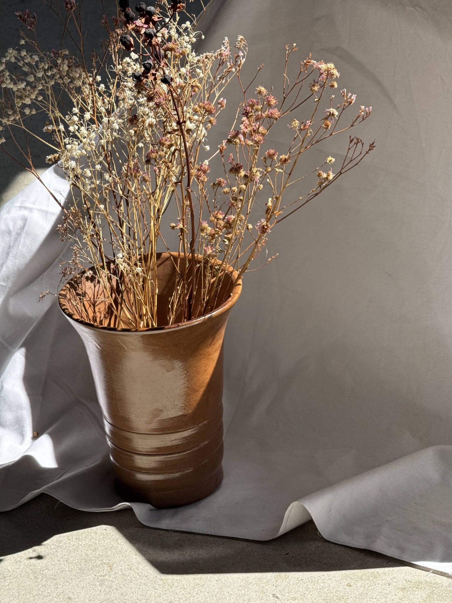 Vintage ceramic vase in glazed brown-orange with stripes H21.5 D19