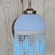 Blue wall lamp with pearl fringes