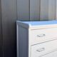 Compass leg chest of drawers
