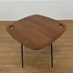 Modernist side table, 1950s, wood and metal, with handles.