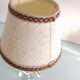 Bedside lamp with glass base and beige fabric lampshade / vintage 60s-70s