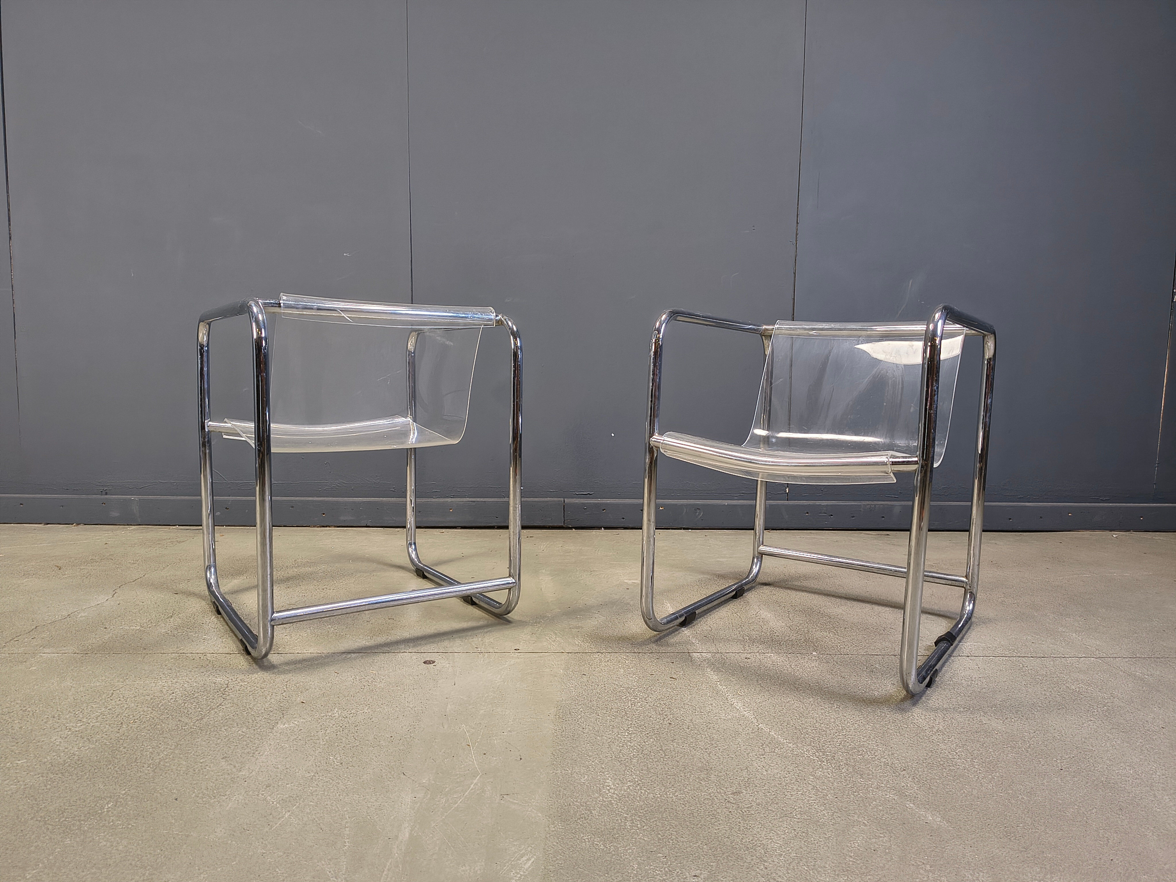 Pair of plexiglass and tubular chrome armchairs, 1970s