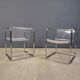 Pair of plexiglass and tubular chrome armchairs, 1970s