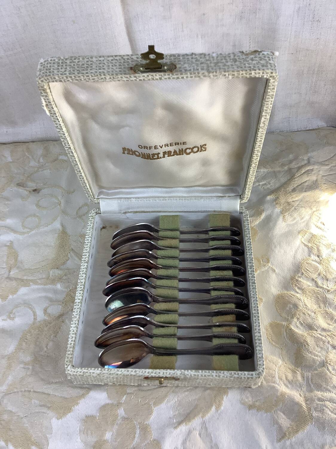 Box of 12 old spoons