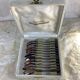 Box of 12 old spoons