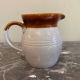 Decorated stoneware carafe