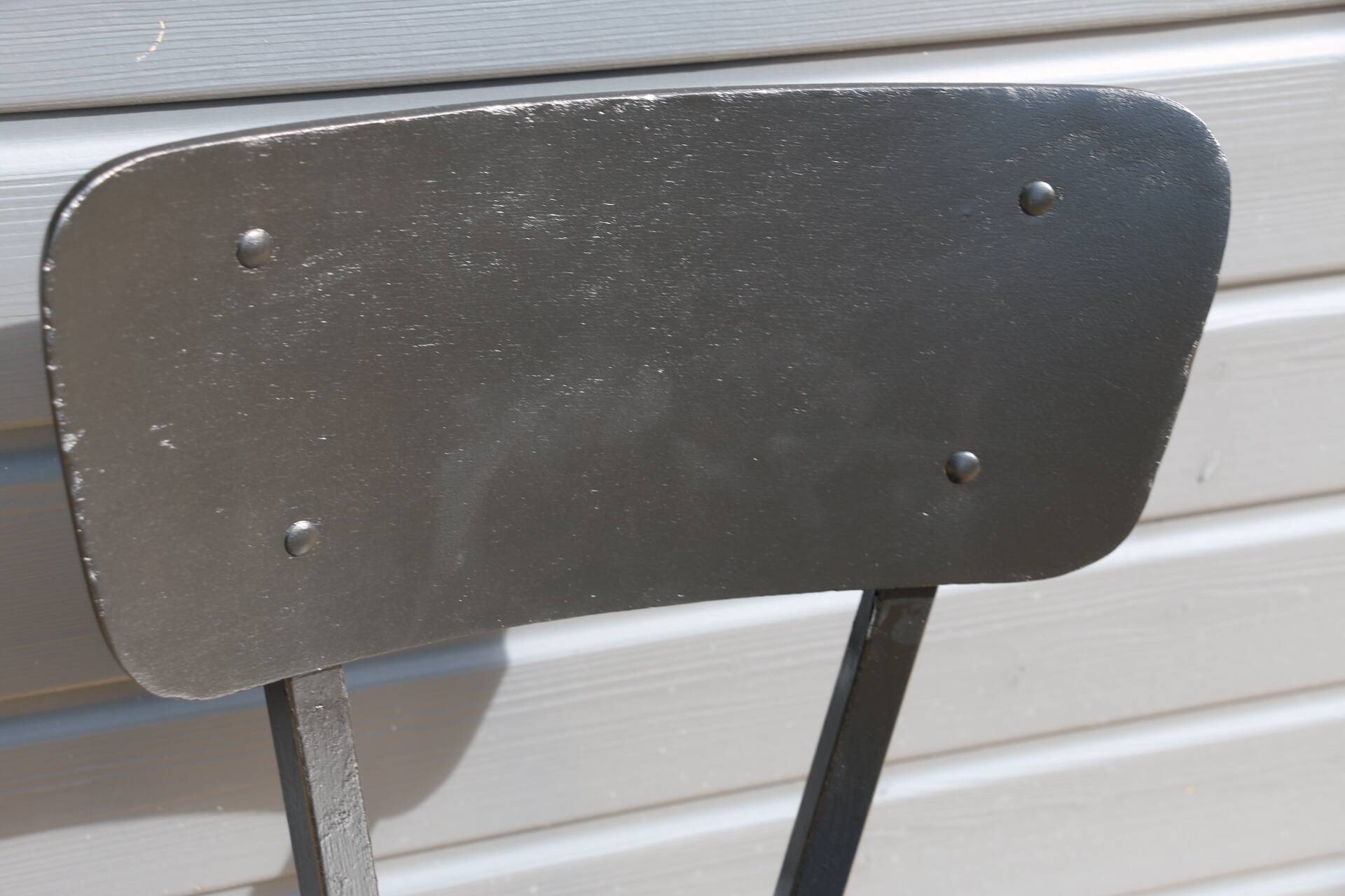 4 black metal and wood chairs