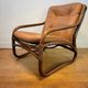 Vintage rattan armchair with leather cushions from 1970