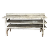 Old wood and metal workbench, workshop furniture.