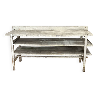 Old wood and metal workbench, workshop furniture.