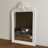 Late 19th century mirror with decorated pediment. 102x66.