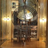 Cage pendulum with its double mercury bulb pendulum.