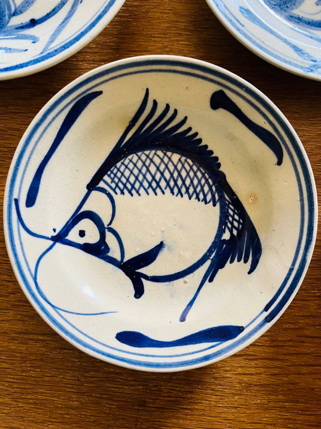Earthenware plates with carp pattern