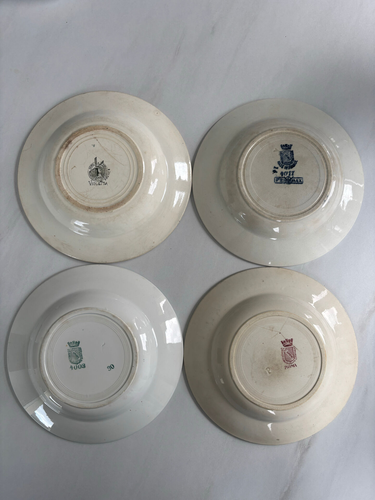 Lot of 4 deep plates, pink, blue, and green ironstone, French earthenware.