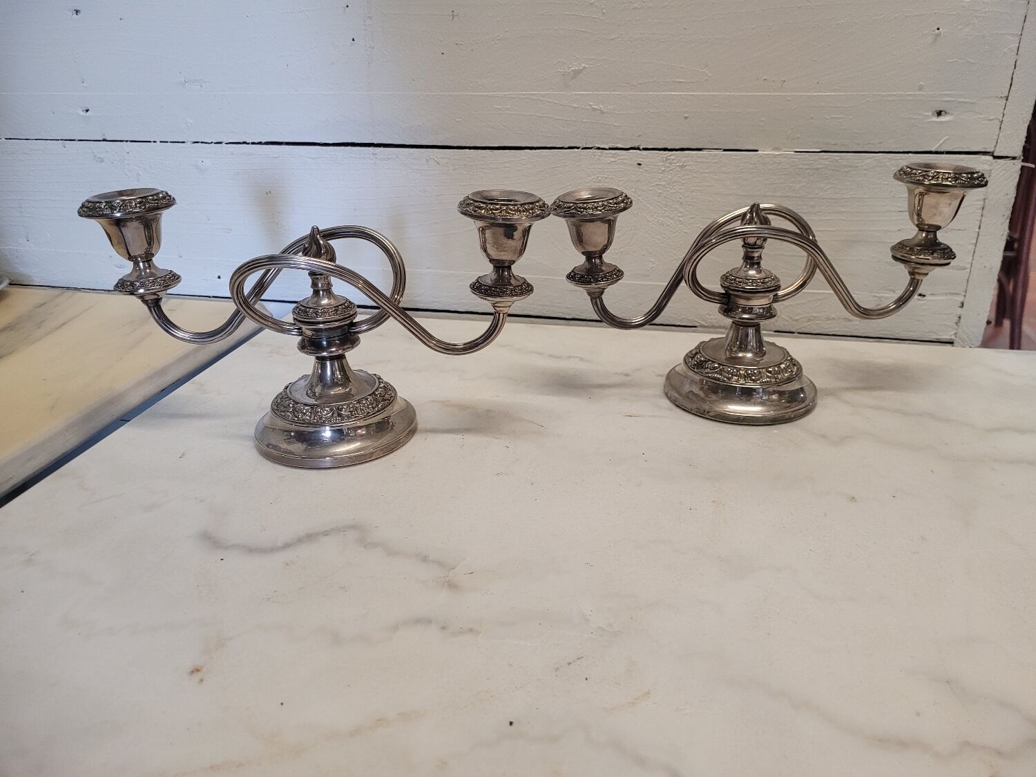 Pair of silver metal candlesticks
