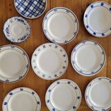 4 ironstone plates with blue pattern.