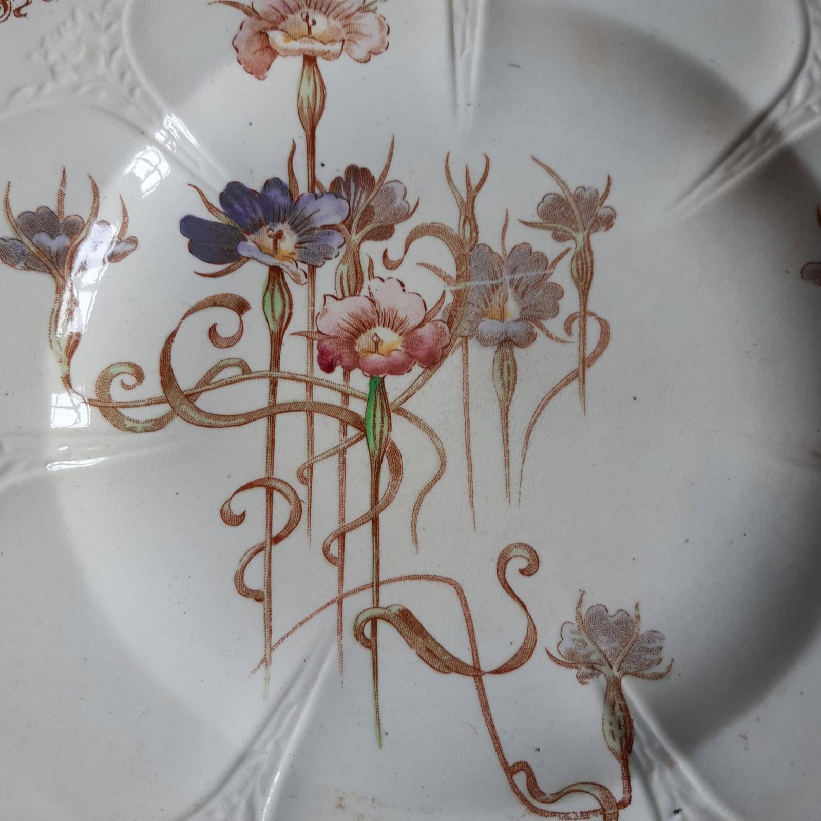 Set of 7 nielles model plates in longwy earthenware, art nouveau, circa 1900