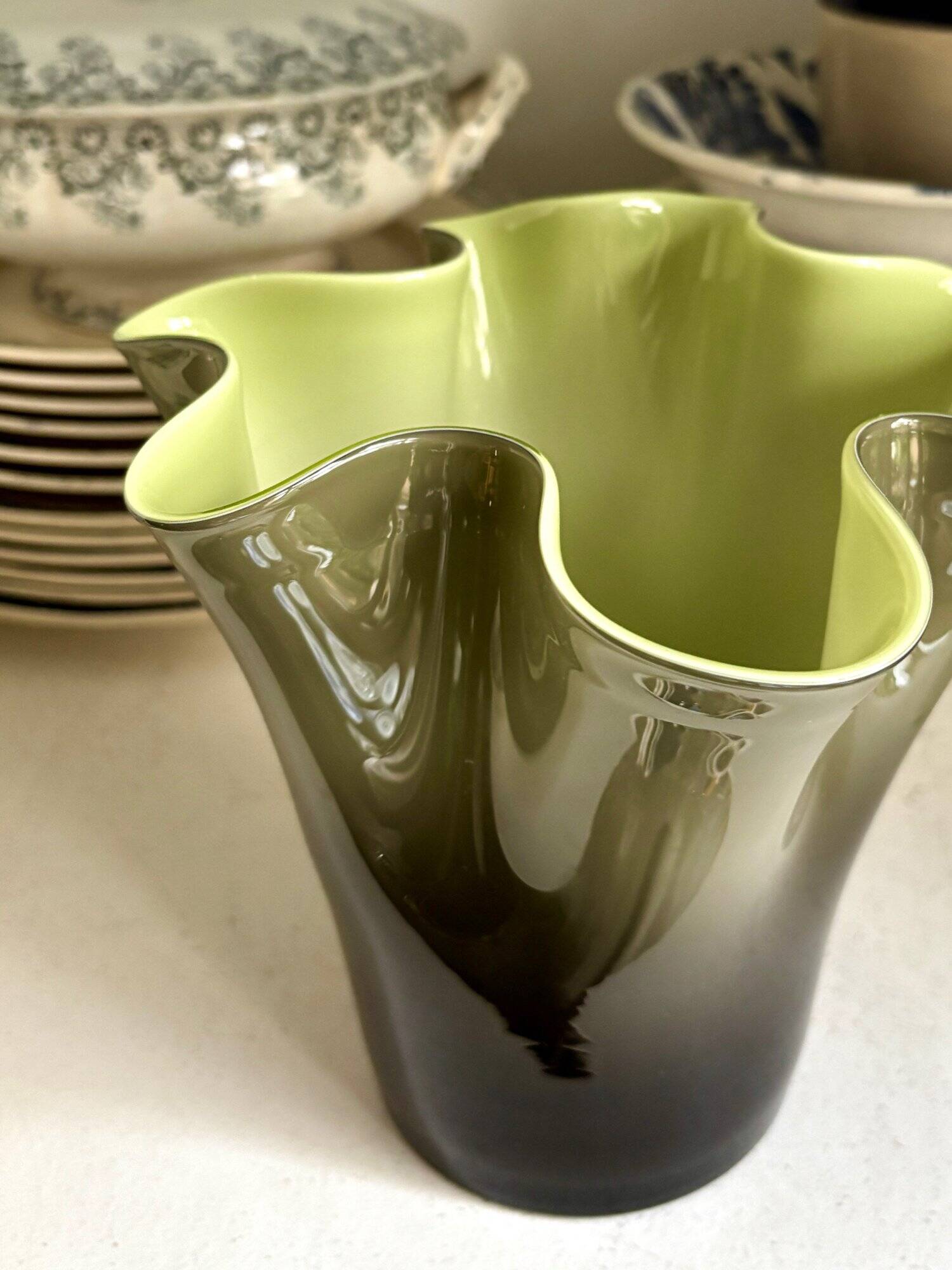 Green blown glass handkerchief vase