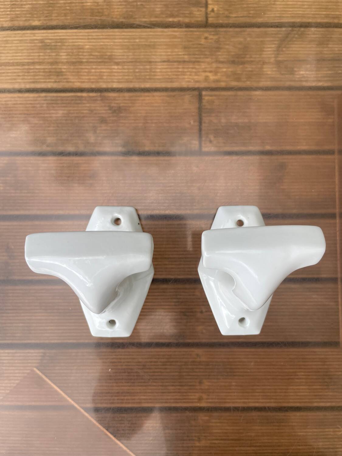 Duo of porcelain hooks