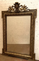 Napoleon III style mirror in wood and patinated stucco XX century