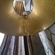 "Lounge Gun" floor lamp by FLOS by Philippe Starck – Gold