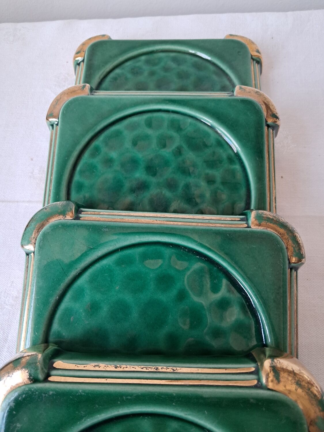 Ceramic trivets and glasses from Poët-Laval. Vintage