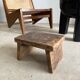 Black mango wood tripod side table with a semi-spherical top, height: 45 cm, diameter: 44 cm.