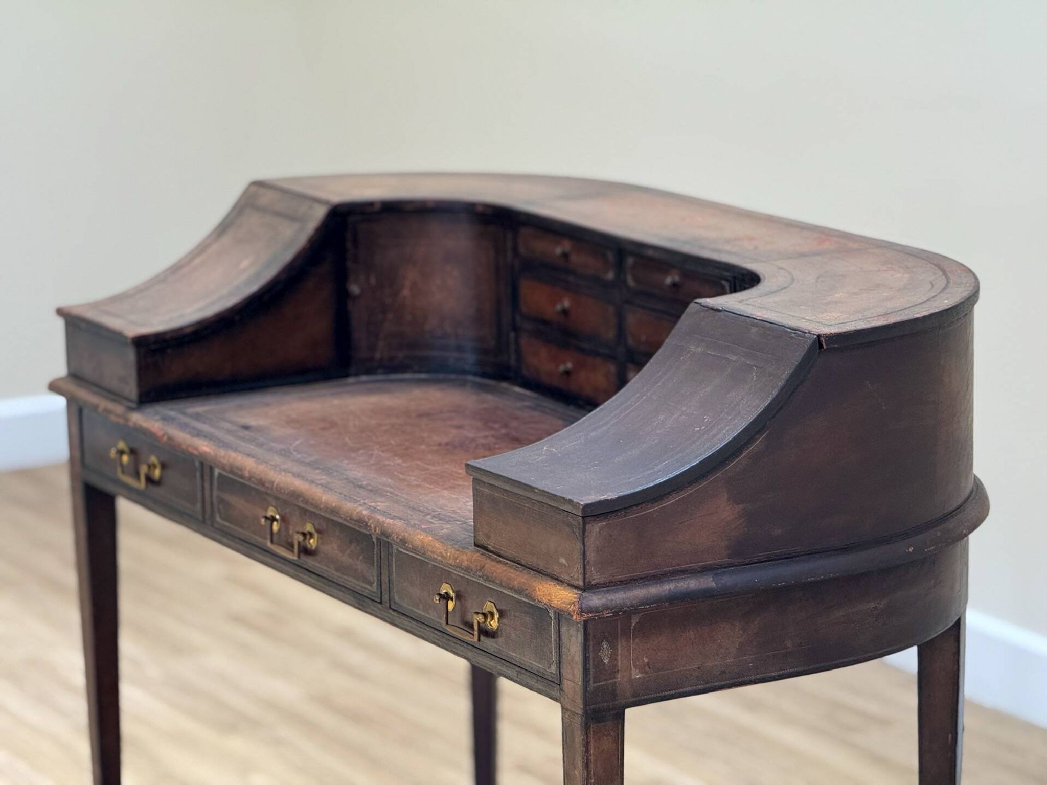 Antique desk by Charles Lowe & Sons