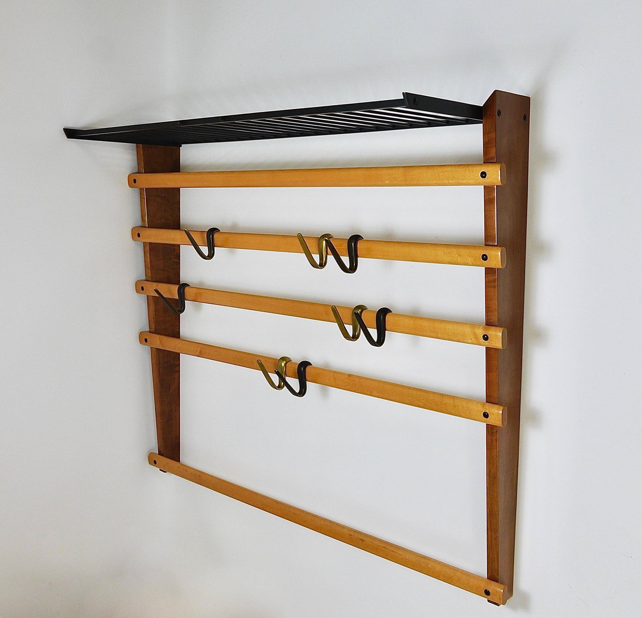 Rare coat rack by Carl Auböck with hat rack, cabinet, brass, walnut and beech, 1950s.