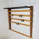 Rare coat rack by Carl Auböck with hat rack, cabinet, brass, walnut and beech, 1950s.