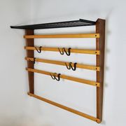 Rare coat rack by Carl Auböck with hat rack, cabinet, brass, walnut and beech, 1950s.