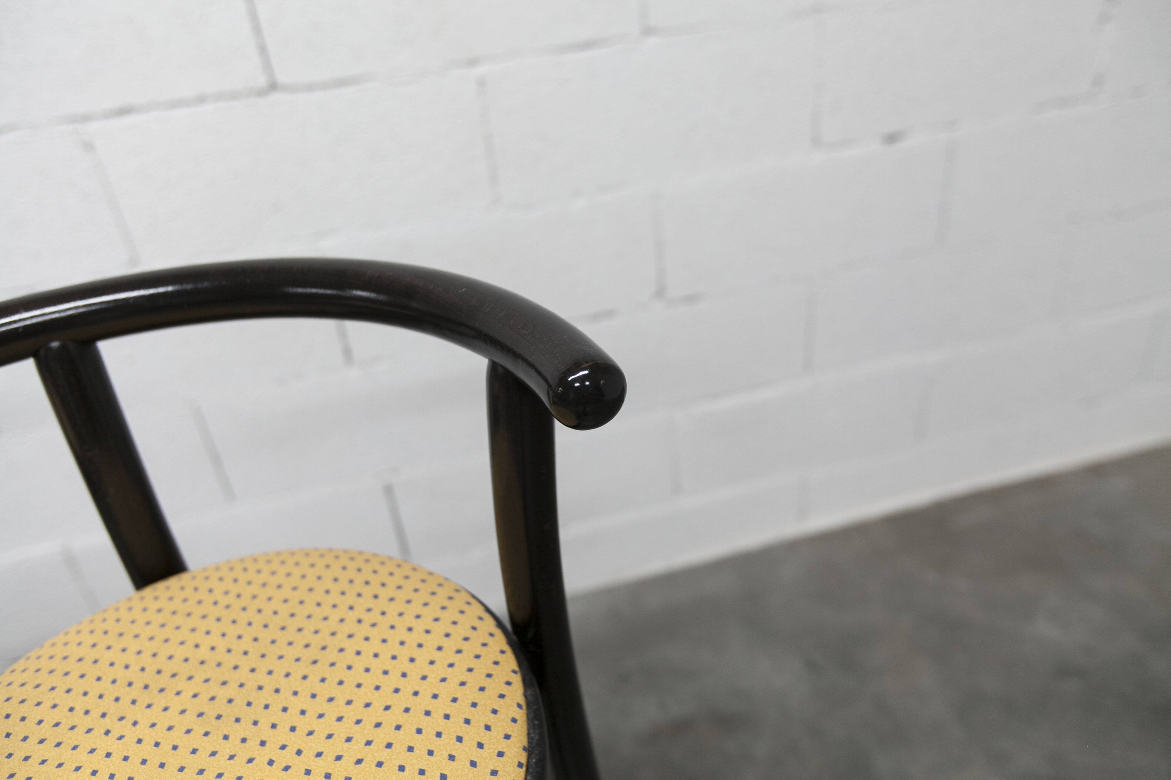 Pair of Baumann Dialog model stools in black and yellow and blue imitation leather, 1990