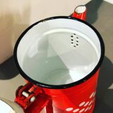 Red enameled coffee pot with white polka dots