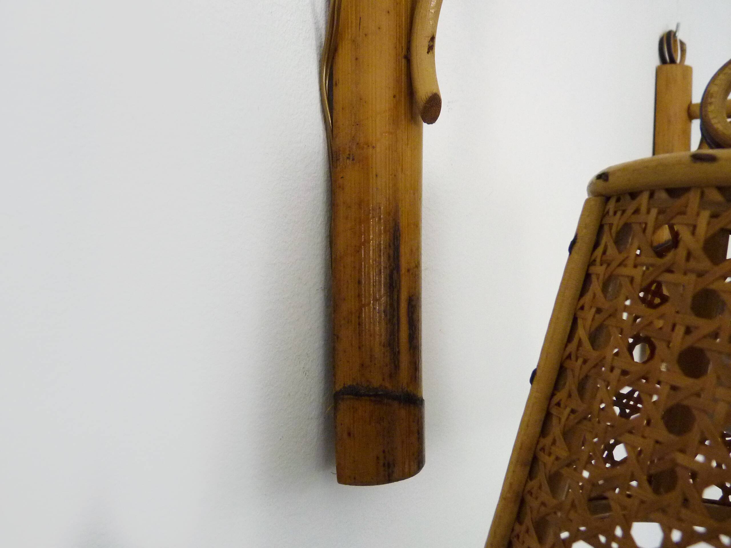 Pair of rattan and cane lantern wall lights. 1950s-1960s