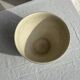 Large speckled beige salad bowl with ochre trim H14 D25