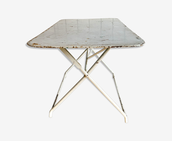 White folding metal bistro table