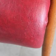 Vintage armchair in red leatherette