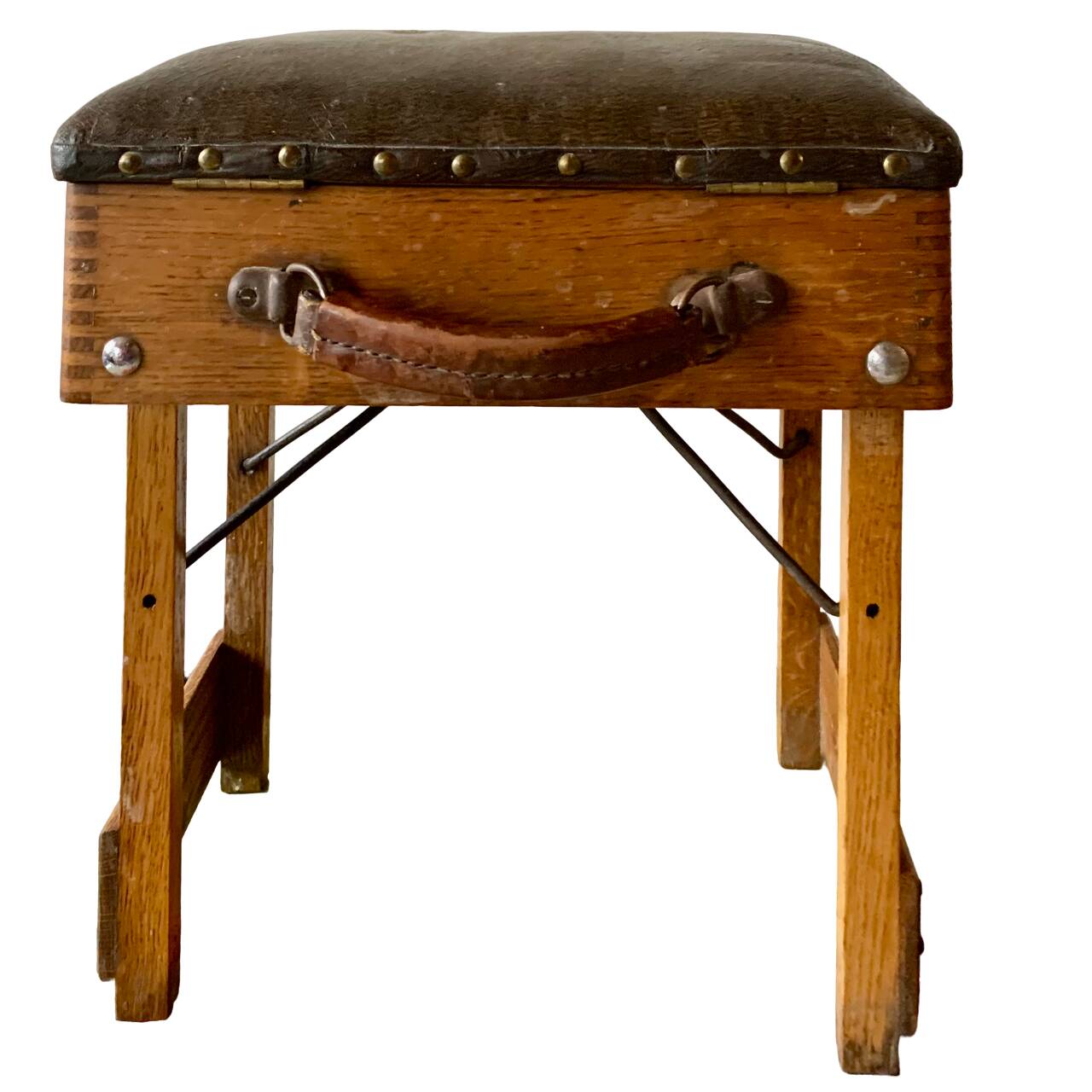 Old foldable fisherman's stool in wood and leather