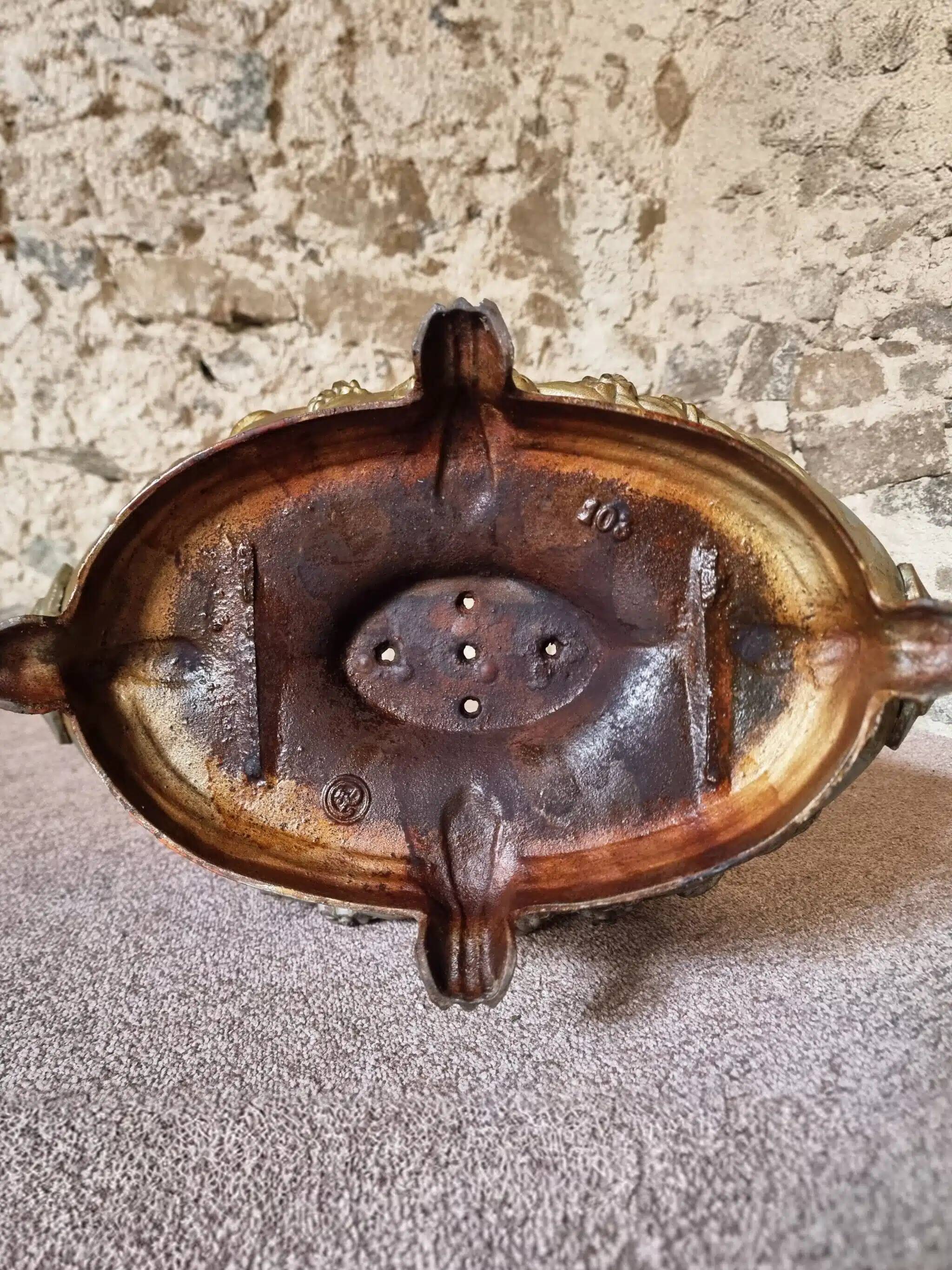 Large antique cast iron planter on a stand, France, circa 1900.
