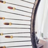 Vintage metal sun mirror in the style of Line Vautrin