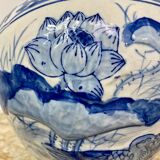 Chinese vase in blue-white porcelain decorated with lotus flowers