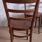 Set of 4 Baumann bistro chairs with round seats.